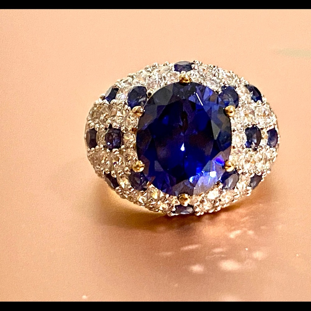 Victoria Weick saphire and Topaz ring